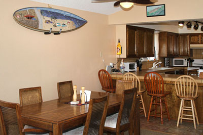 The kitchen bar seats 4, Dining table can expand to seat up to 10