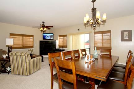 The upstairs family room dining table seats 10