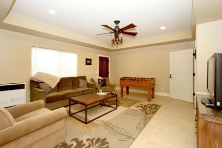 Downstairs Family Room includes Foosball Table, Television, DVD and VHS player.