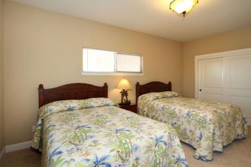 Upstairs bedroom has two comfortable full beds with pillow-top mattresses, plus 2 roll-away beds
